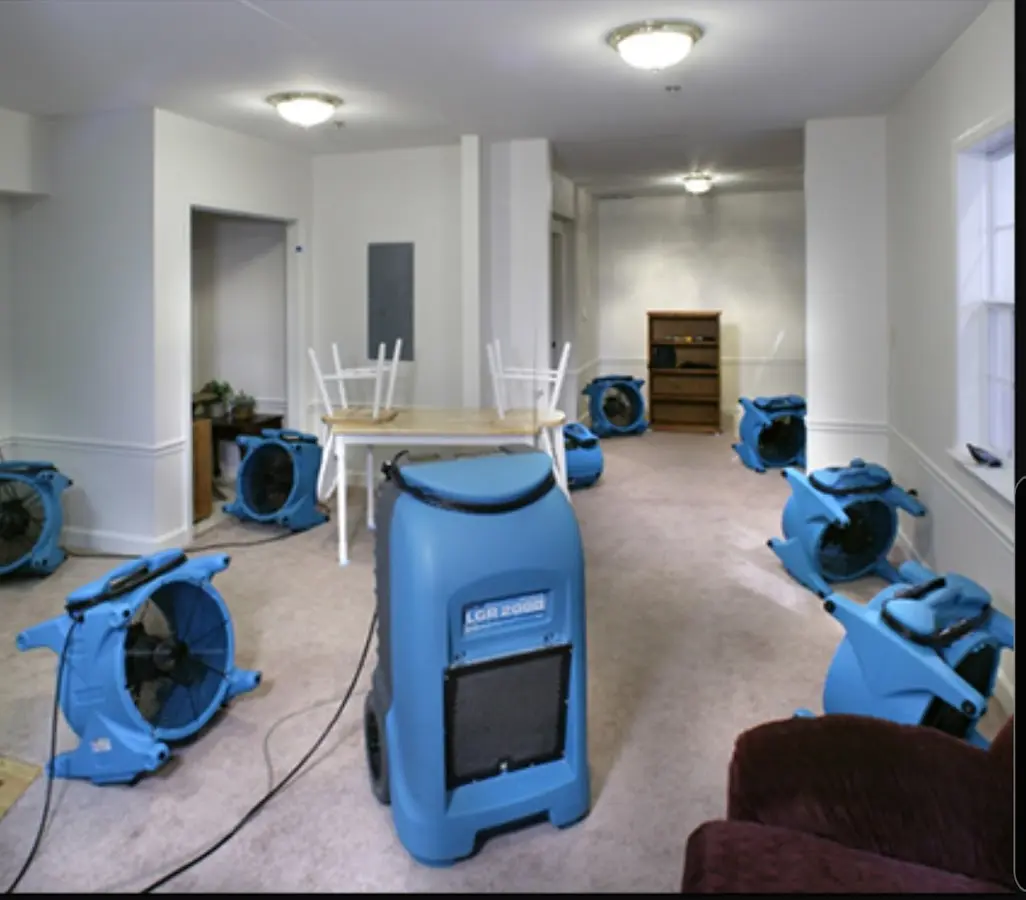 Air movers and dehumidifier setup for Water Damage Restoration in Penfield